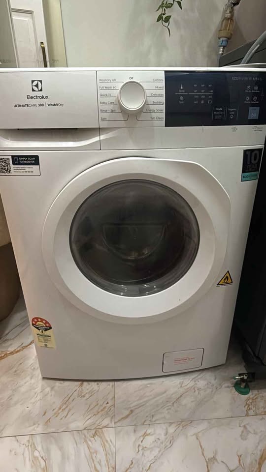 Electrolux 8kg/5kg 5-Star front-load EWW8024D3WB washer-dryer shown from the front