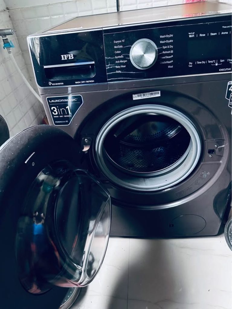 Front view of an IFB WDR Executive ZMN 3-in-1 washer-dryer with the drum door open