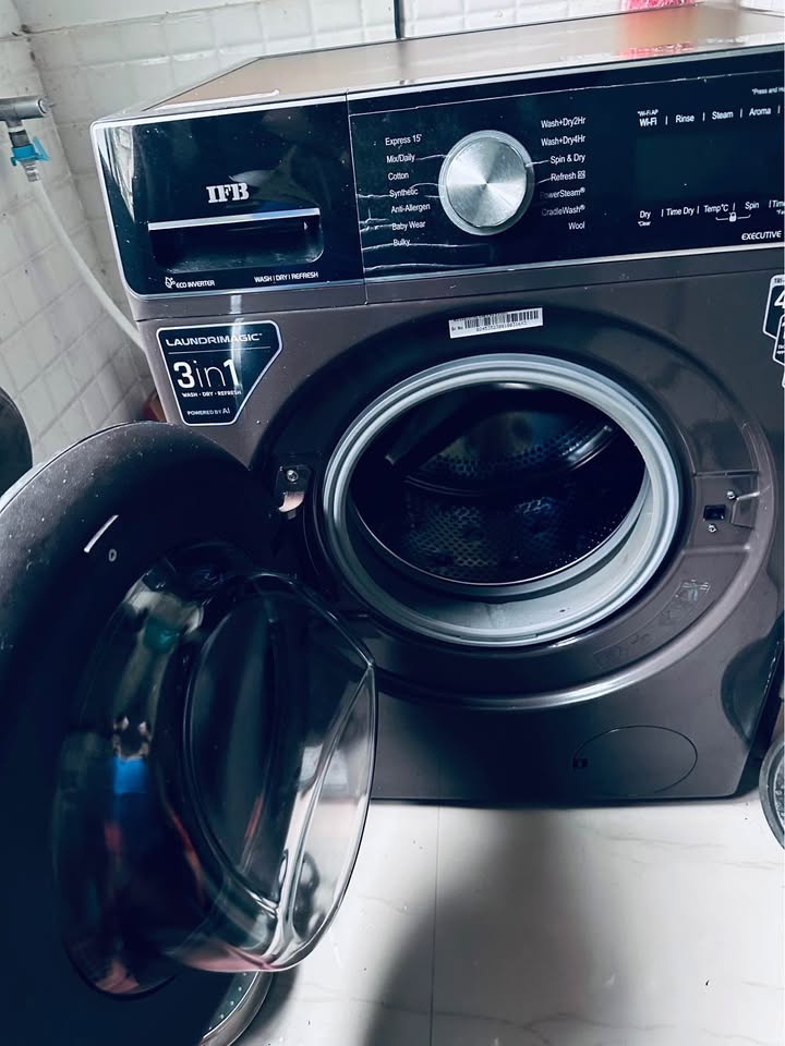 Front view of an IFB WDR Executive ZMN 3-in-1 washer-dryer with the drum door open