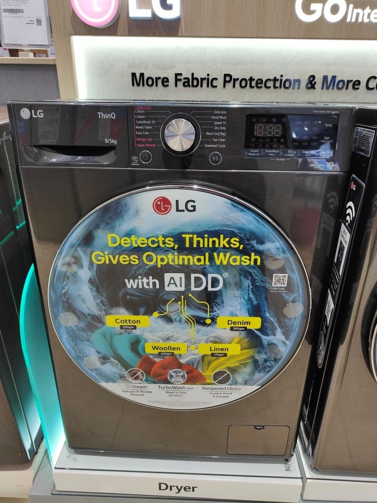 Front view of LG 9/5 kg washer-dryer FHD0905SWM with control panel