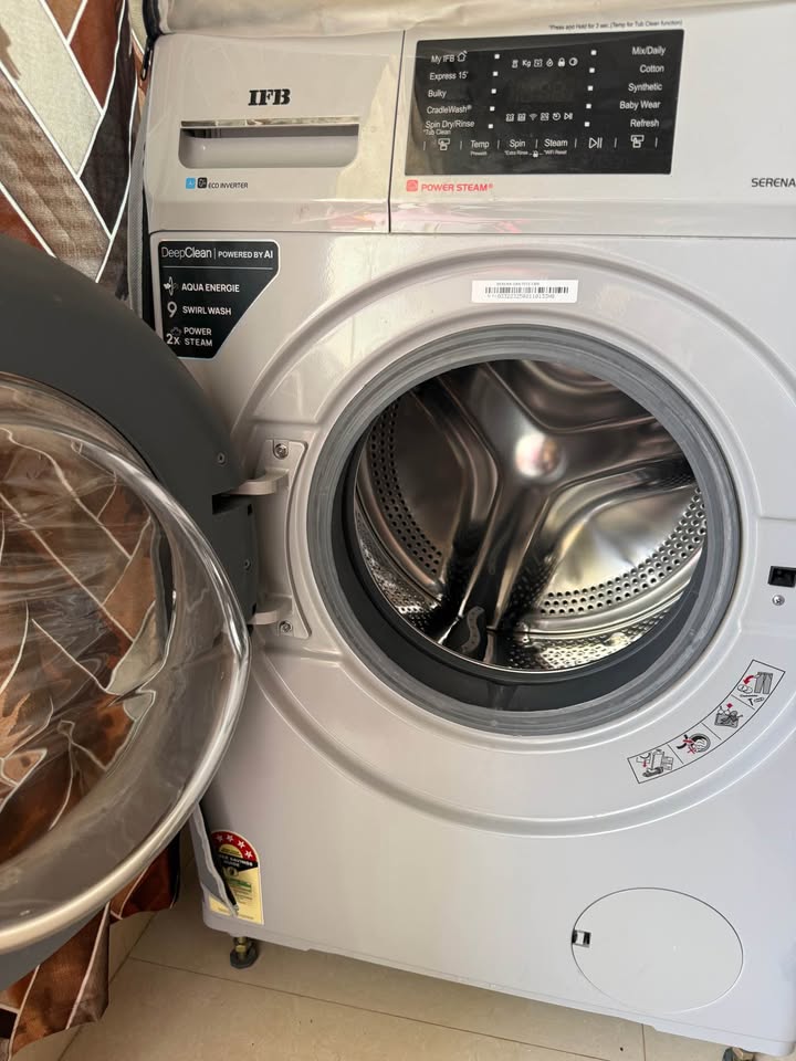 IFB Serena GXN 7012 front-load washing machine control panel showing wash programs, digital display, and lint filter details