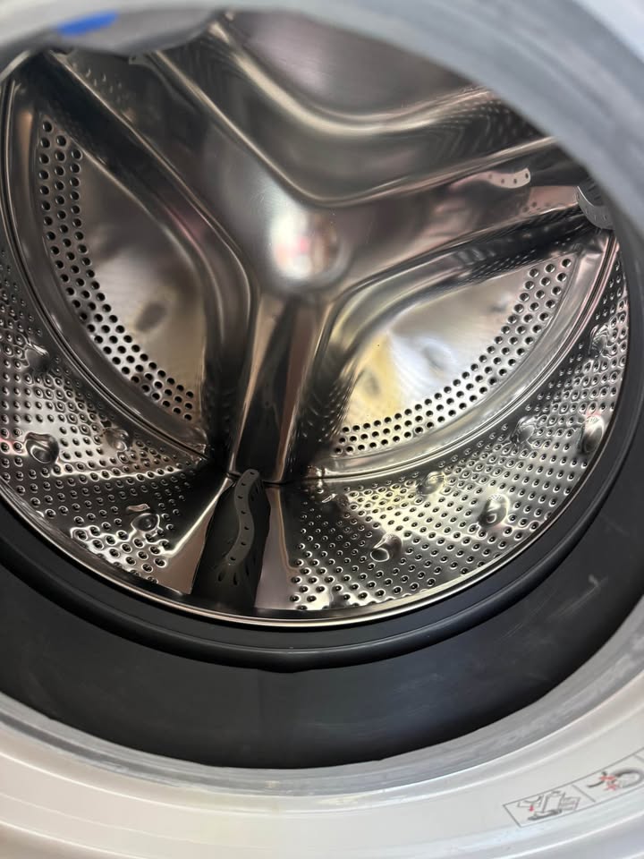 IFB Serena GXN 7012 front load washing machine stainless steel drum with perforated holes and paddles
